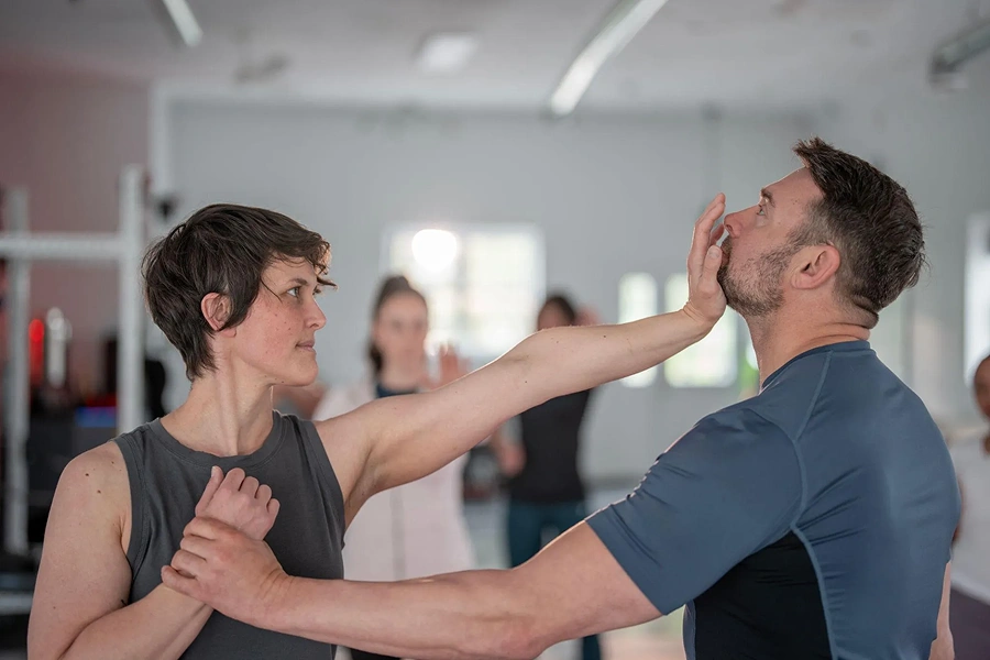 Woman practicing martial arts move
